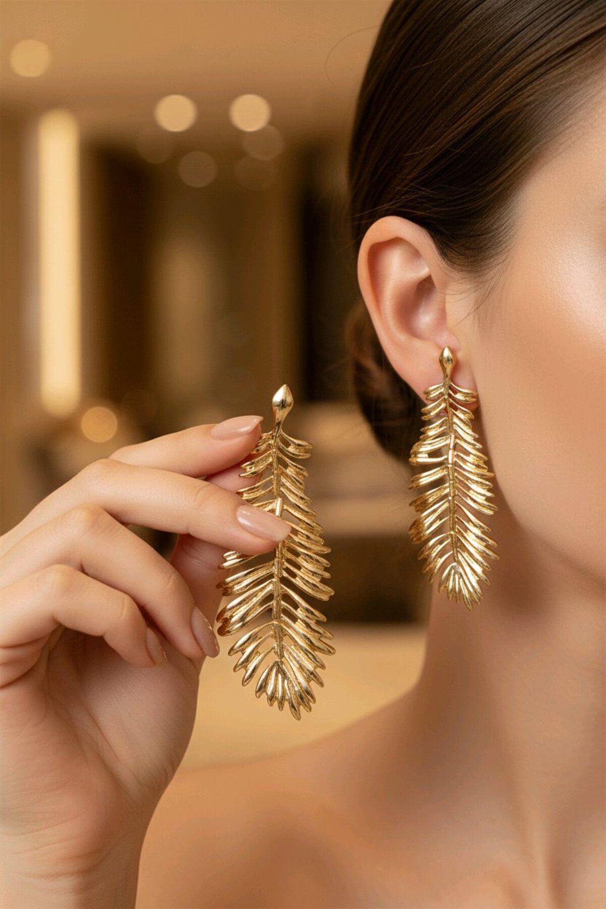 Marka Model, Gold Çelik Uzun Yaprak Hafif Kadın Küpe