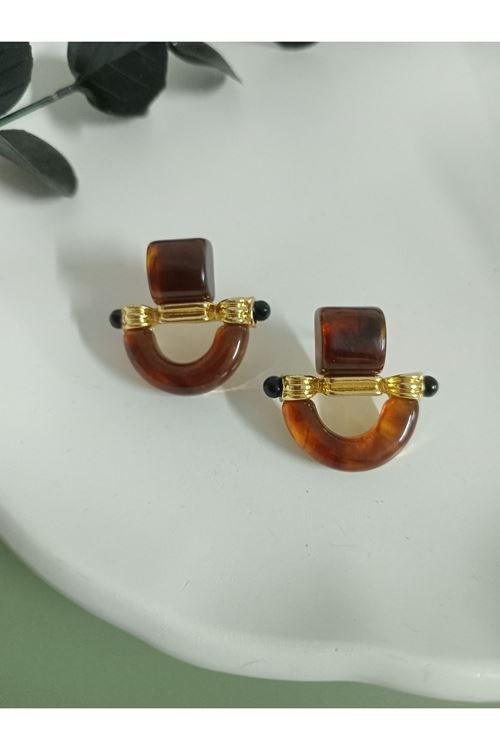 Marka Model, Kahverengi Küpe